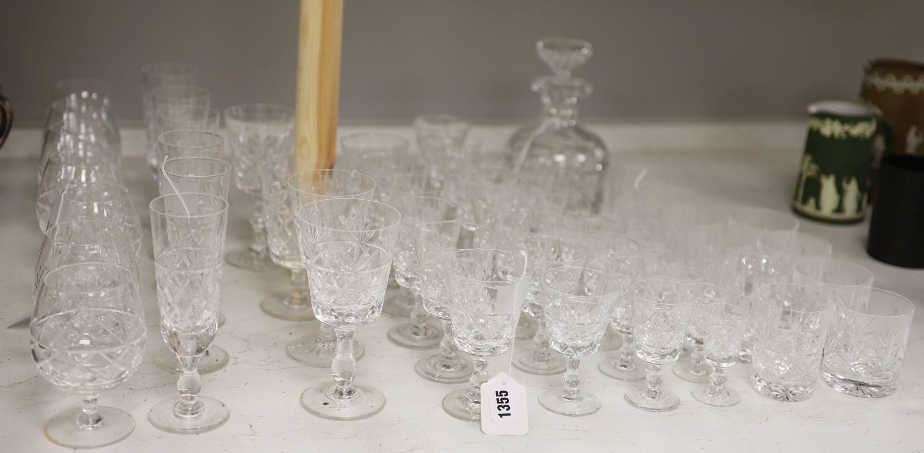 A Brierley cut glass decanter and stopper and a part suite of Brierley 'Bruce' pattern table glass,